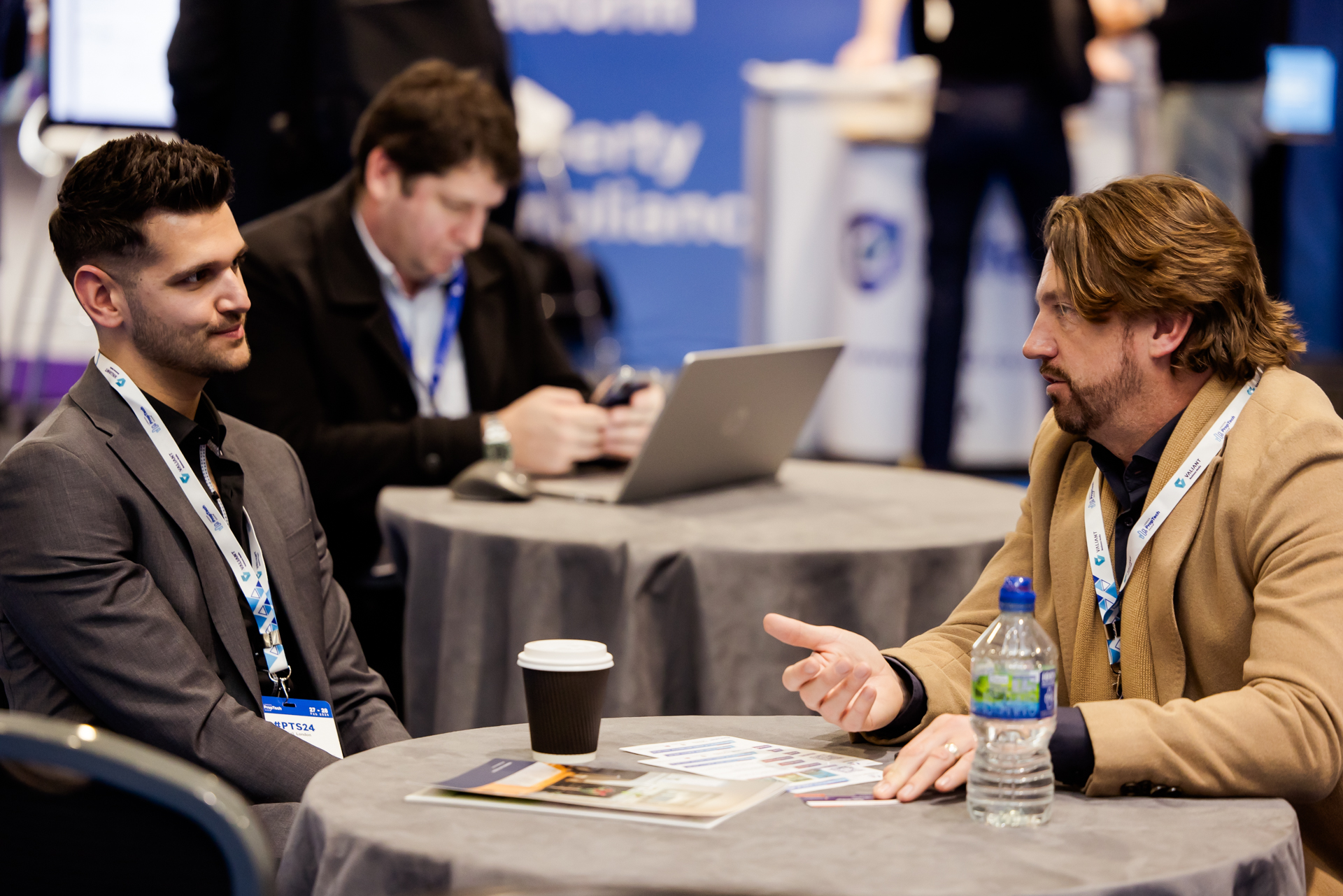 Business meeting between attendees at the event
